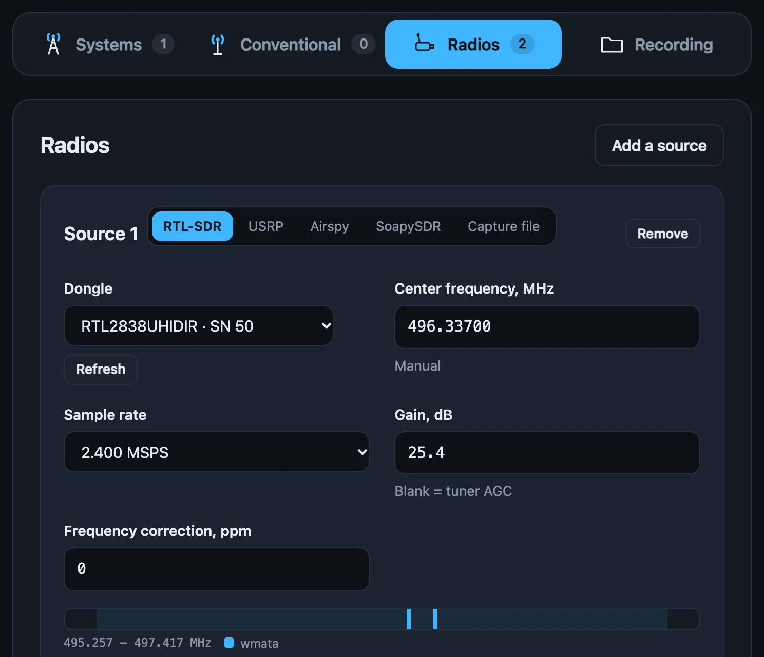 The Radios tab: two RTL-SDR sources with center frequency, sample rate, gain and ppm, each with a bar showing which configured channels fall inside it.